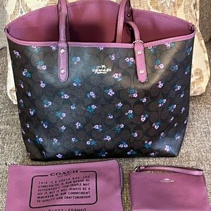 Coach Reversible Tote with matching wristlet and cosmetics bag.
